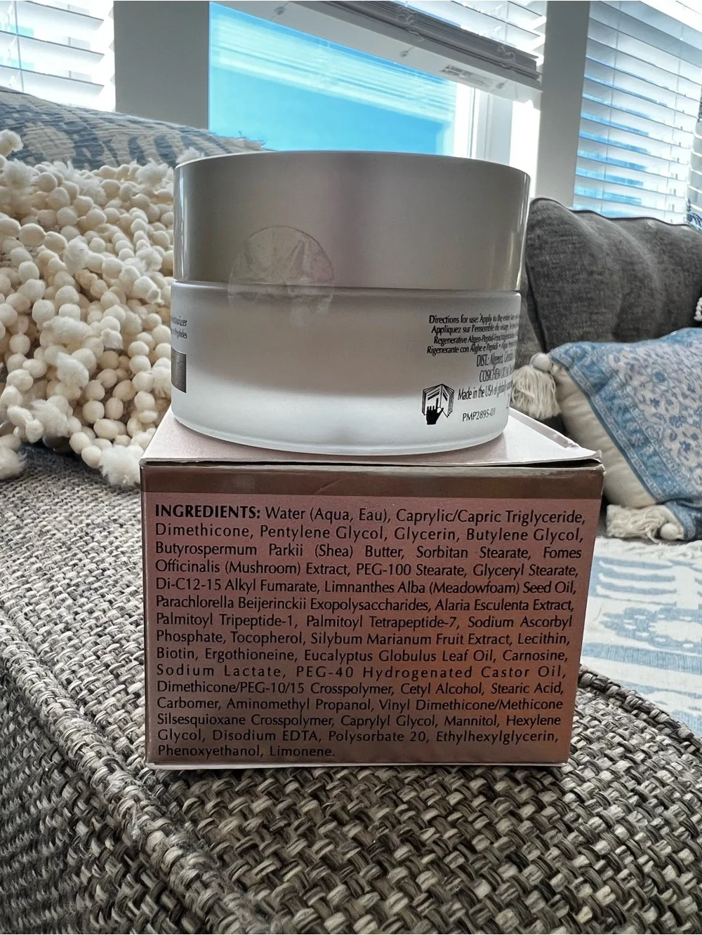 Algenist Moisturizer in Rose Gold and White